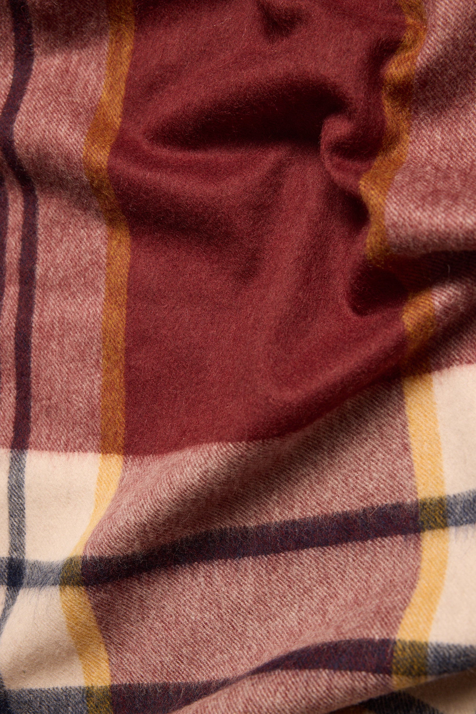 The Max Maddie Brushed Check Scarf features red, yellow, cream, and navy tones in a close-up.