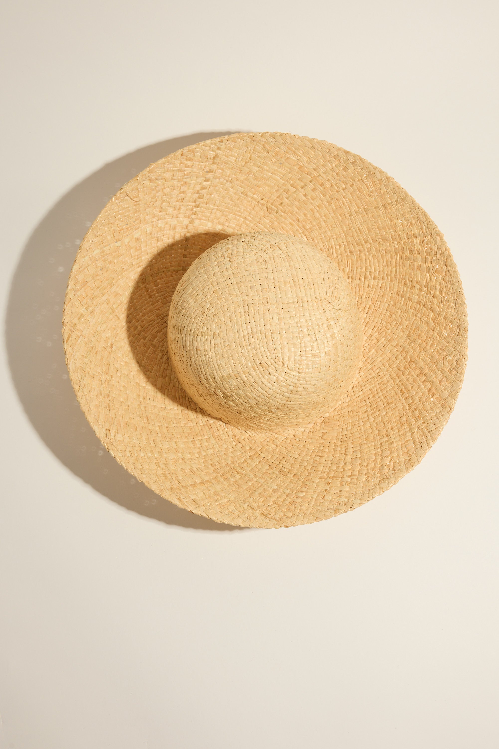The Jenna Structured Bucket Hat by Max in dark brown sits on a light background.