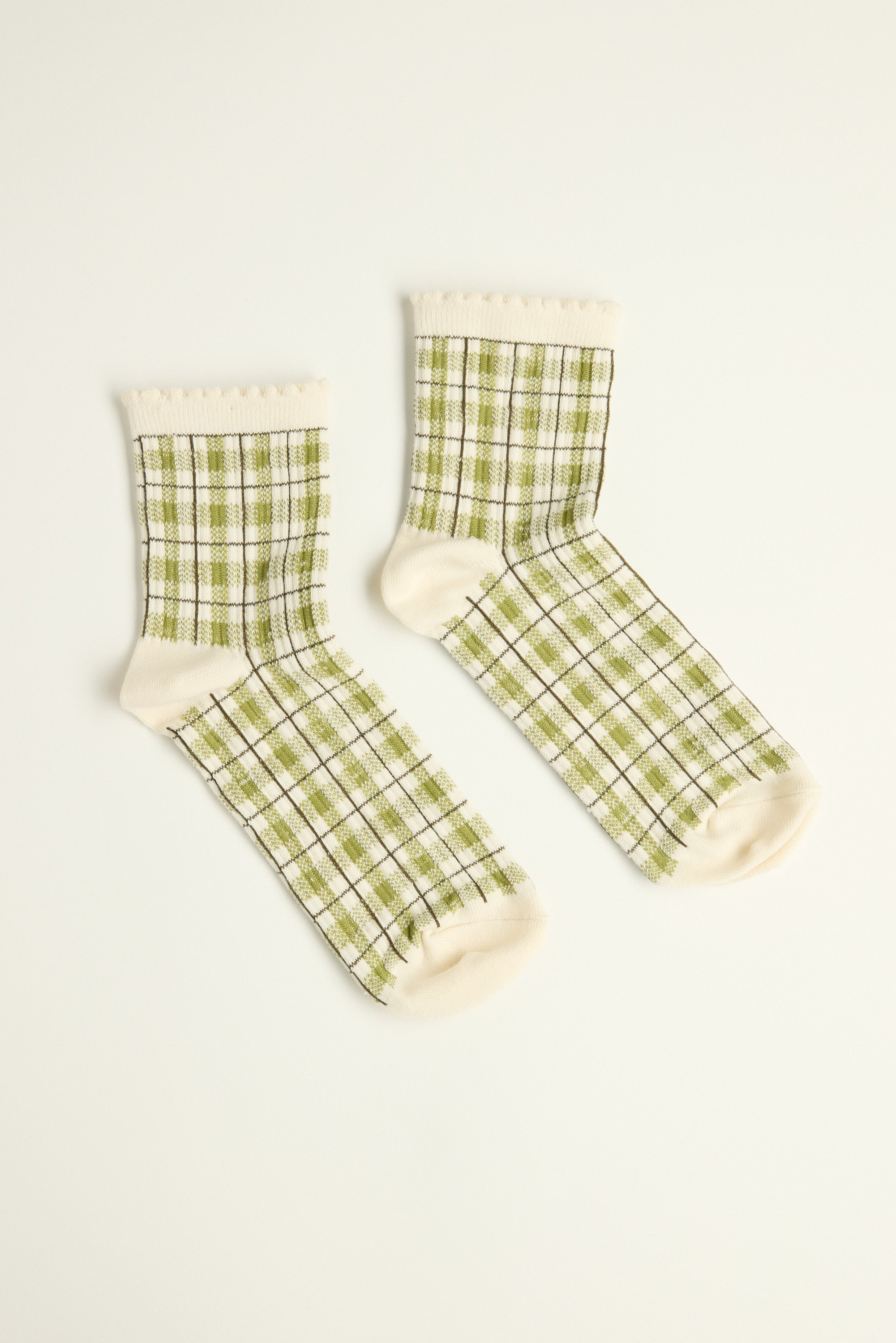 Max Steph Check Socks in cream with green and brown plaid, shown flat on white background.