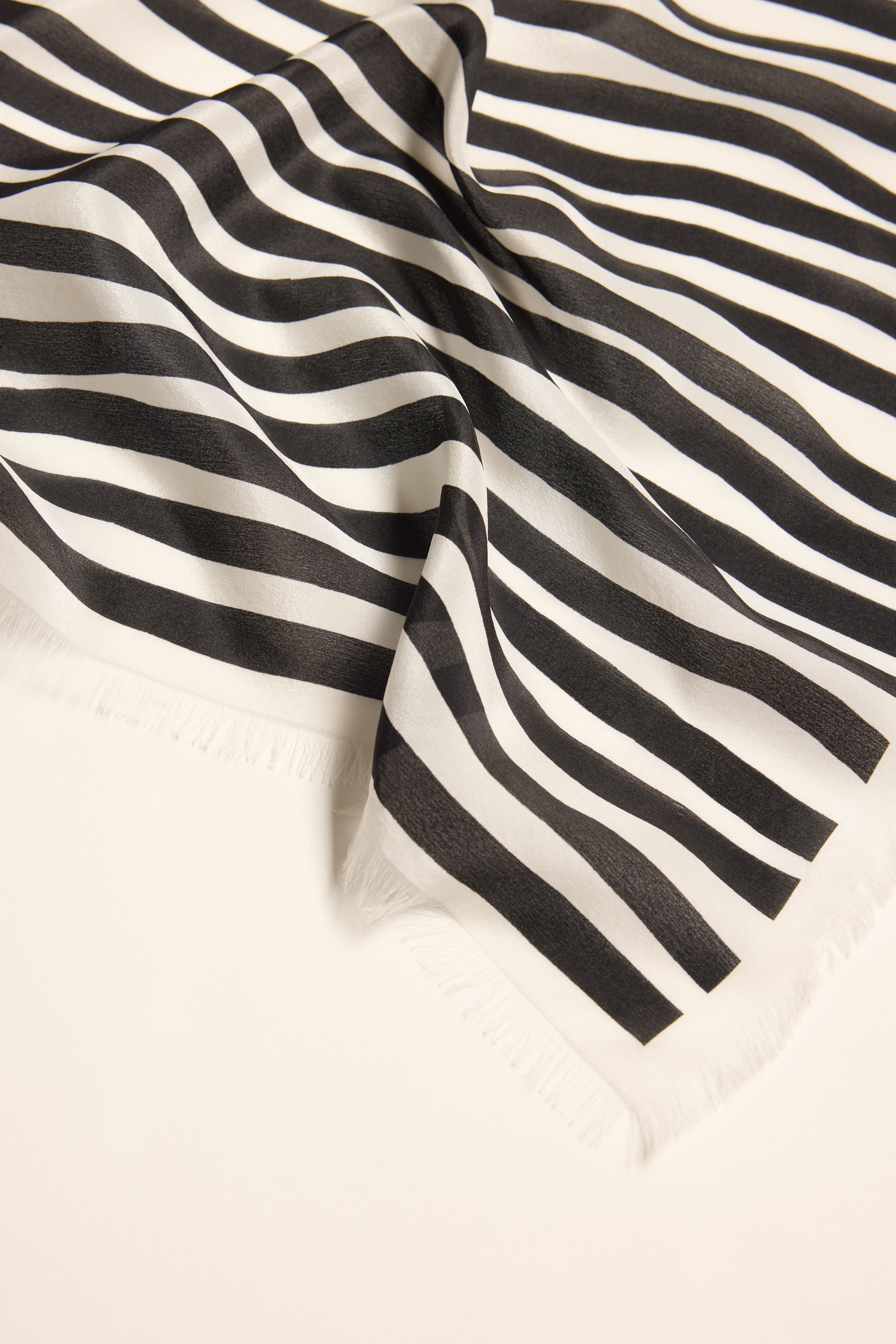 Max Mable Frayed Edge Silk Scarf in black and white, displayed on a flat surface.