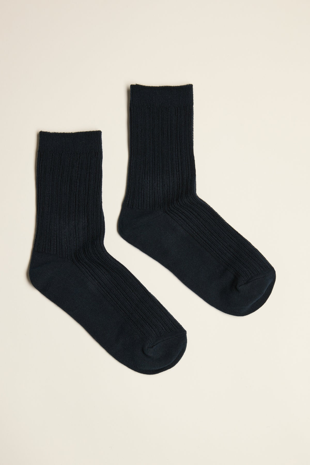Erina Textured Rib Socks by Max—black everyday essentials on a plain light background.