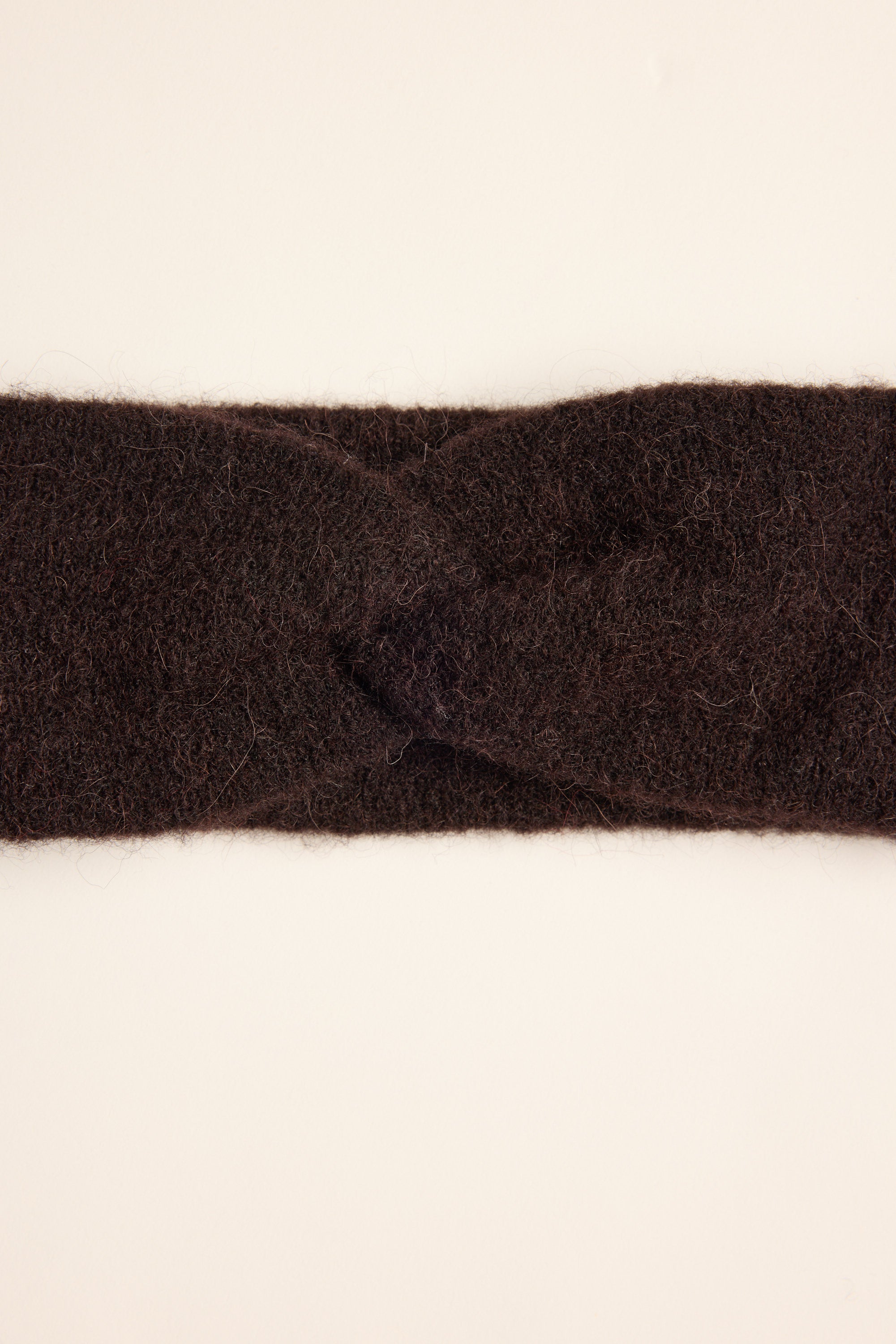 The Max Mel Luxe Whisper Knit Knot Headband in dark brown—your chic trans-seasonal accessory.