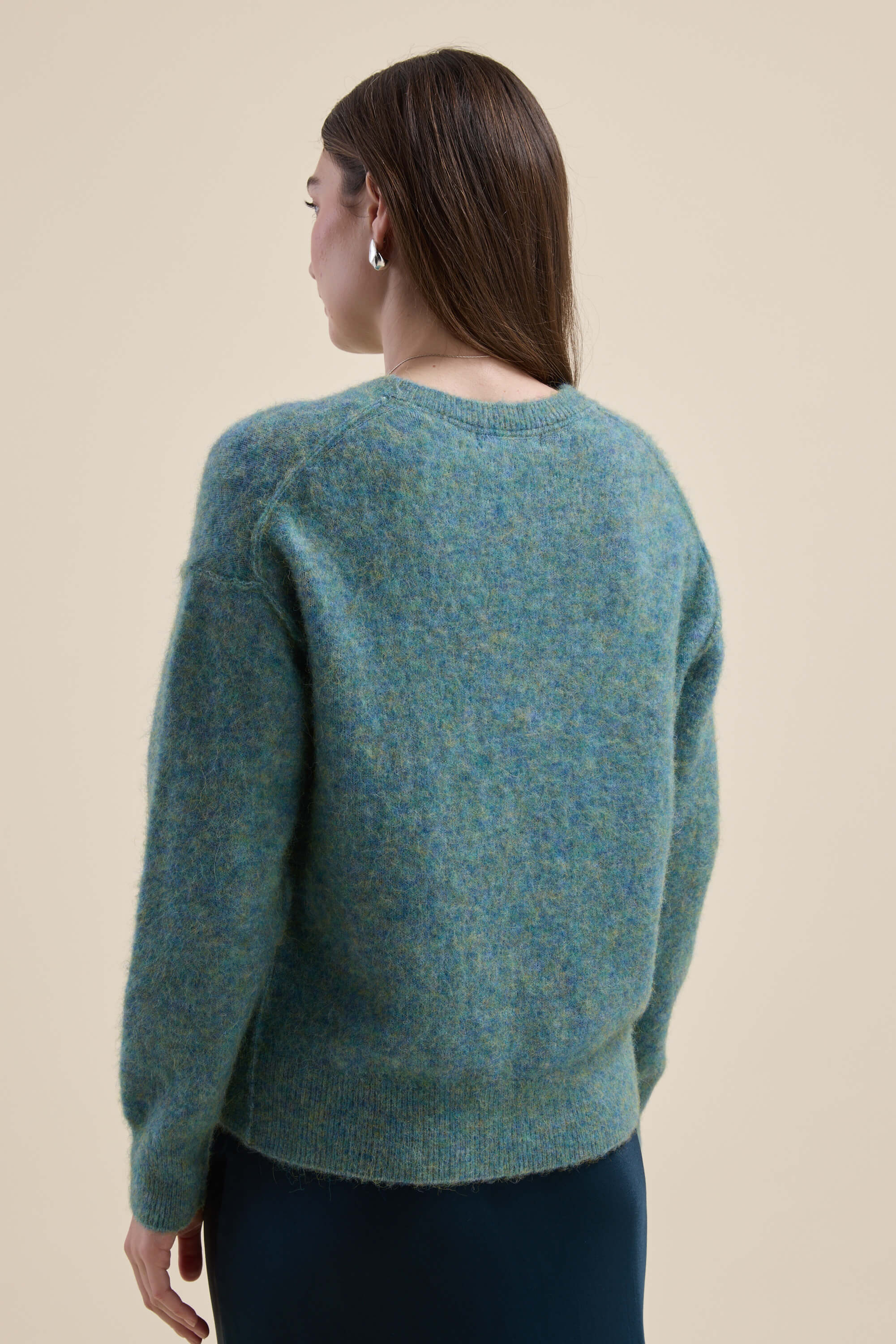 Woman with long brown hair in the Max Devon Luxe Whisper Crew Neck Sweater, facing away.