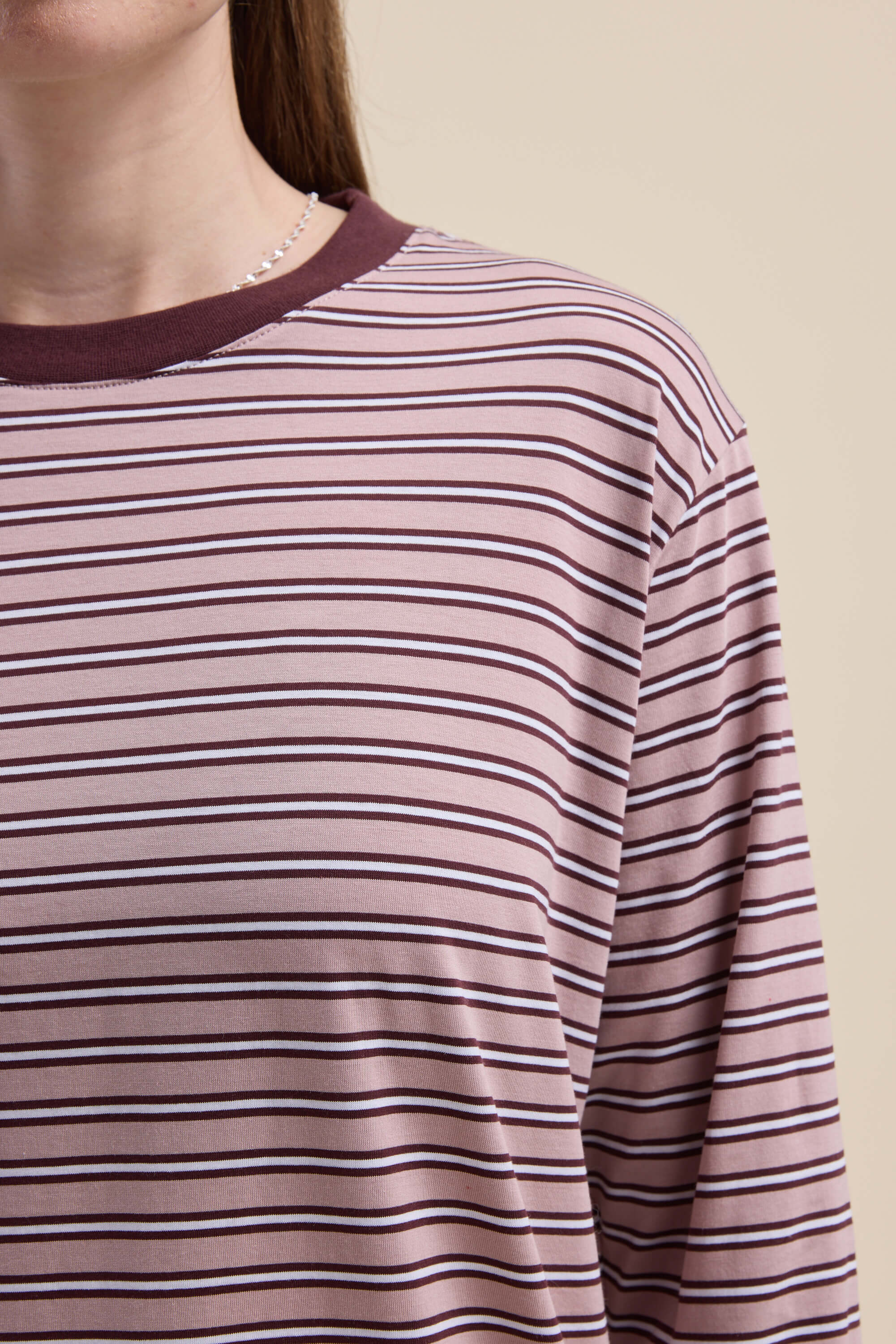 Person wearing Max Carmen Long Sleeve Stripe Tee in maroon and white with a maroon collar.