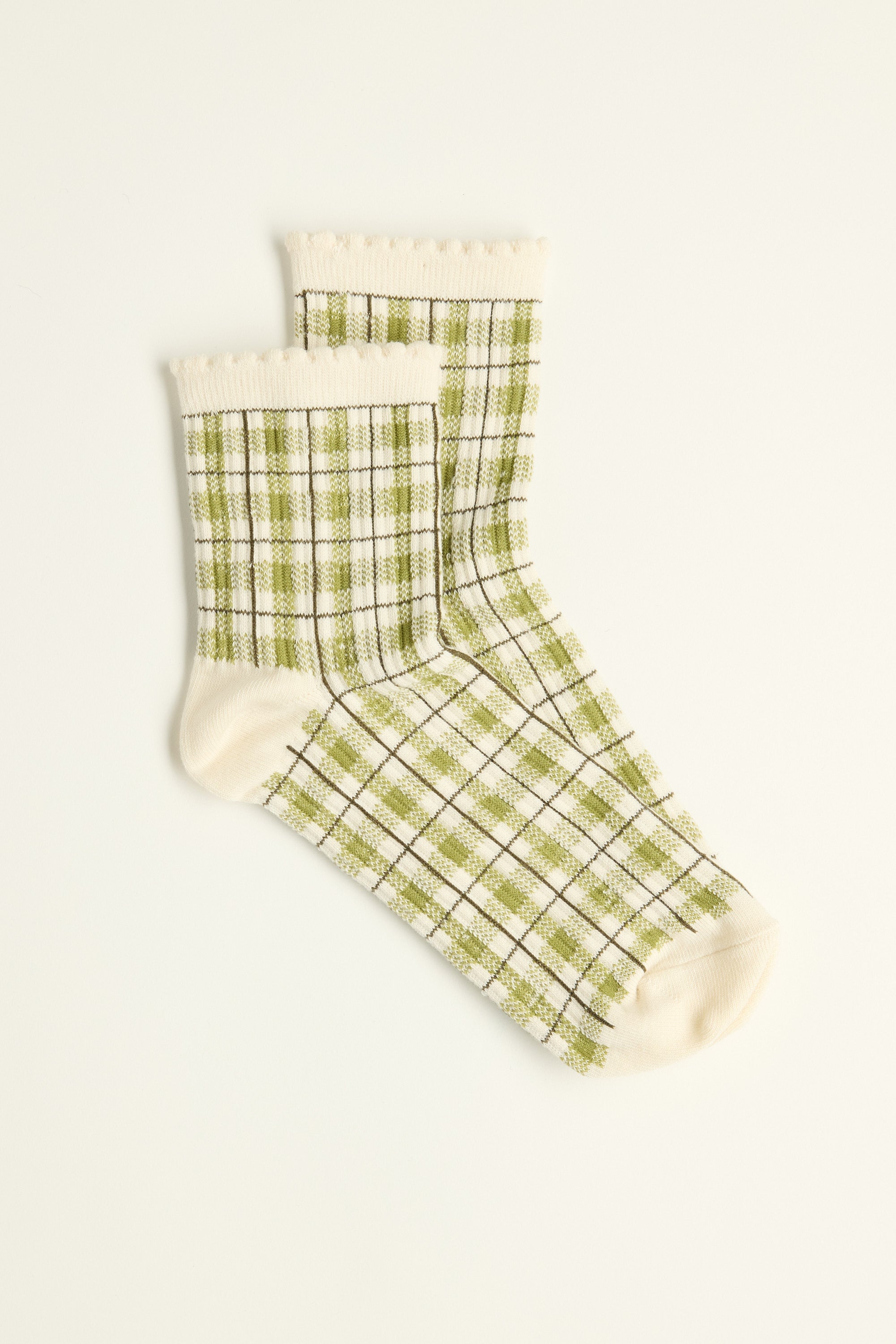 Max Steph Check Socks: cream with olive green and black plaid on a white background.