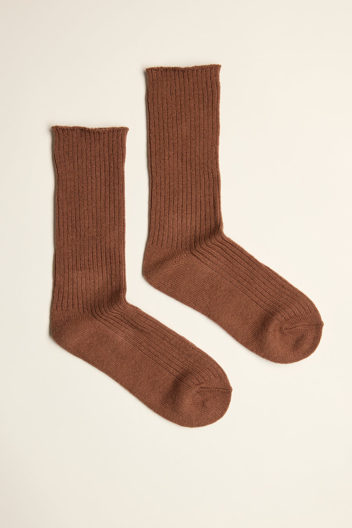 Max Eden Wool Crew Socks in brown on beige—cozy essentials for your winter wardrobe.