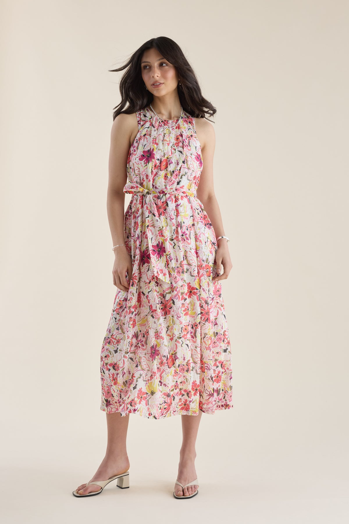 Woman wears the Max Kira Back Detail Dress with sandals, standing against a plain background.