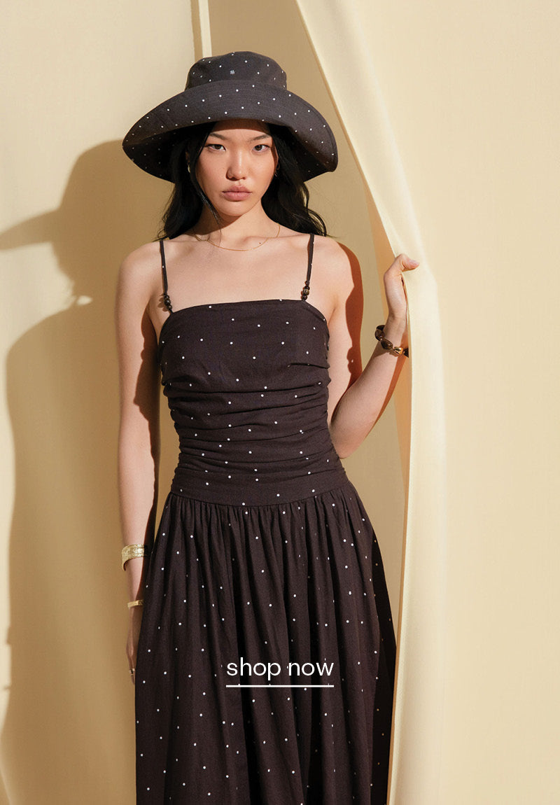 A woman wearing The Strappy Midi Dress