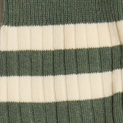 Close-up of NZ-inspired ribbed fabric with green and white horizontal stripes.