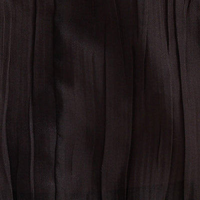 Close-up of NZ dark brown pleated fabric with vertical textured lines.