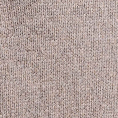Close-up of NZ beige knitted fabric texture.