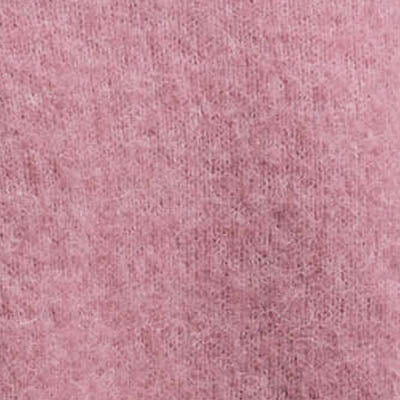 Close-up of soft pink NZ fabric texture.