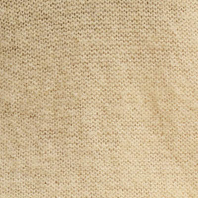 Close-up of beige NZ knitted fabric with a subtle, textured pattern.