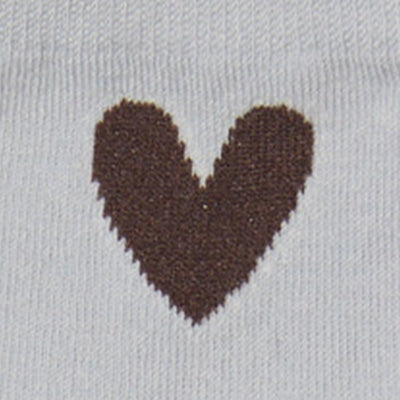 A brown heart shape on a light gray NZ knitted fabric background.