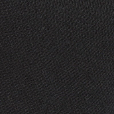 Close-up of black fabric with a fine, textured knit pattern.